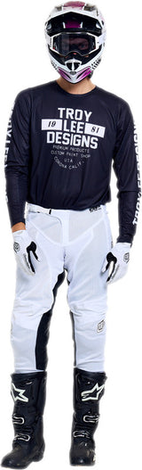 Troy Lee Designs GP Pro Air MX-Jersey Seal Schwarz, atmungsaktive schwarze Motocross-Jacke mit TROY LEE DESIGNS Logo.