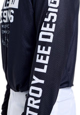 Troy Lee Designs GP Pro Air MX-Jersey in Seal Schwarz, atmungsaktive Motocross-Lizenzjacke mit TROY LEE DESIGNS Logo.