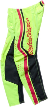 MX-Hose von Troy Lee Designs GP Pro Jugend, gelb und fuchsia, mit Schutzverstärkungen und sportlichem Design.