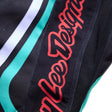 Kinder-Motorradhose von Troy Lee Designs GP Pro in Schwarz und Petrol, robuste MX-Hose für junge Fahrer