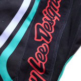 Kinder-Motorradhose von Troy Lee Designs GP Pro in Schwarz und Petrol, robuste MX-Hose für junge Fahrer