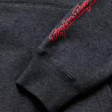 Troy Lee Designs Imprint Hoodie in Schwarz Heather, bequeme Freizeitbekleidung mit stilvollem Design, Blick auf Kapuze und Logo.