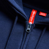 Troy Lee Designs Zip-Up Badge Hoodie in Dunkelblau und Sage, bequeme Freizeitbekleidung mit Badge-Design, frontal fotografiert
