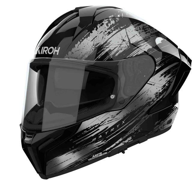 Schwarzer und grauer Airoh Matryx Reflex Integralhelm mit reflektierenden Details, aerodynamisches Design und komfortables Innenfutter.