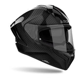 Schwarzer Airoh Matryx Carbon Integralhelm mit aerodynamischem Design und Belüftung, für sicheren Schutz beim Motorradfahren.