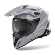 Airoh Commander 2 Endurohelm in zementgrau mit Visier und Belüftungsöffnungen, robustes Schutzdesign für Offroad-Abenteuer.