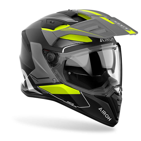 Endurohelm Airoh Bandit Tune in mattschwarz, grau und fluo-gelb mit sichtbarem Visier und Belüftungsöffnungen.