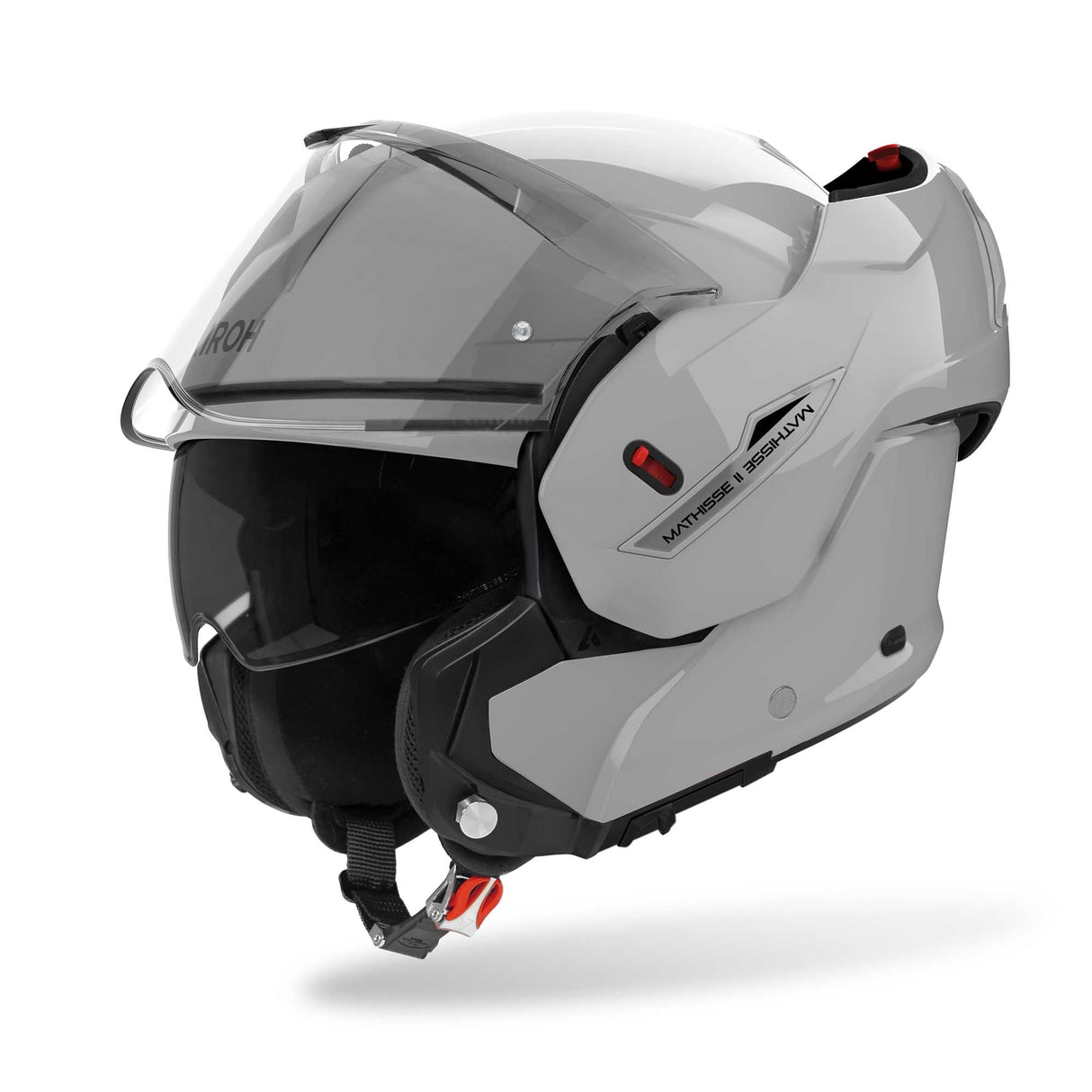 Airoh Mathisse II Klapphelm in Zement Grau, mit klappbarem Visier und aerodynamischem Design, auf einem schwarzen Hintergrund.