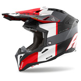 Motocrosshelm Airoh Aviator 3 Monarch in matt-schwarz, grau, weiß und rot mit Visier und Belüftung.
