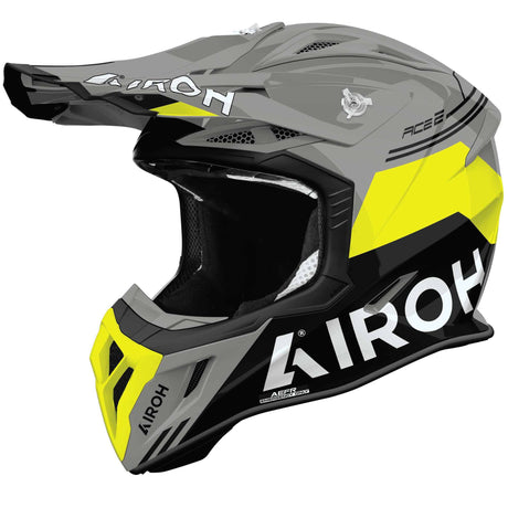 Motocrosshelm Airoh Aviator Ace 2 Fury in Grau, Schwarz, Fluo-Gelb mit Visier und Belüftungsöffnungen.
