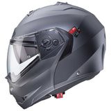 Matt-gun metallic Caberg Duke X Klapphelm mit aerodynamischem Design und Belüftungssystem, sichtbar auf dem Bild.