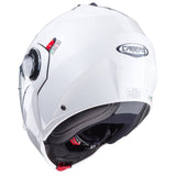 Weißer, metallicer Caberg Duke Evo Klapphelm mit aerodynamischem Design und bequemer Innenausstattung.