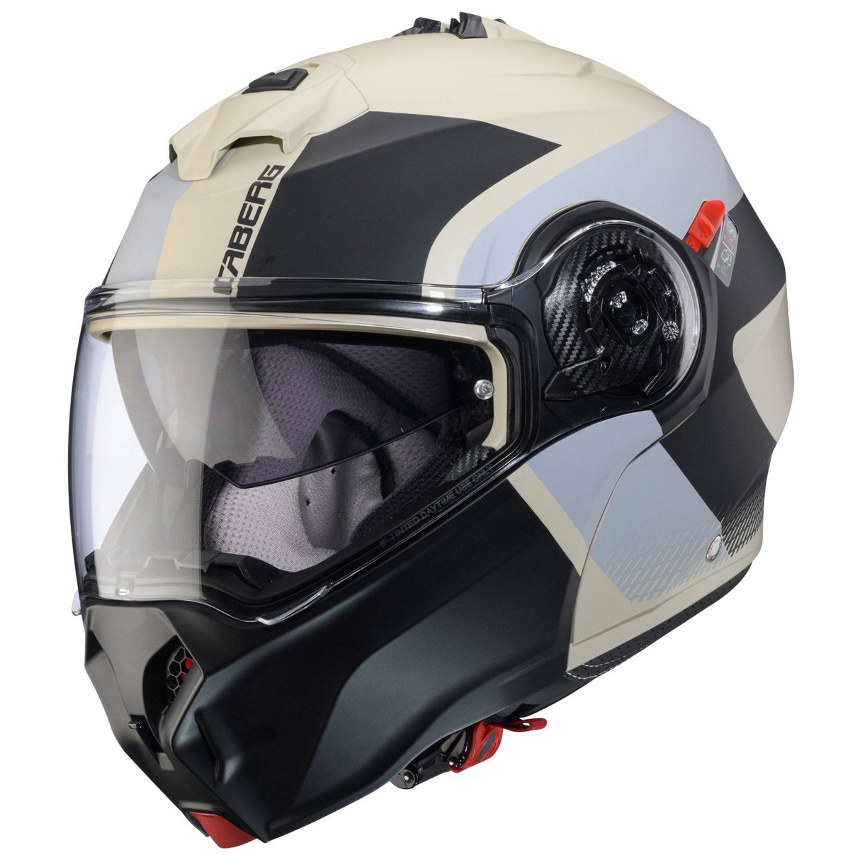 Matte sandbrauner und schwarz-grauer Klapphelm von Caberg Duke Evo Indy, mit hellem Design und sicherer Passform.