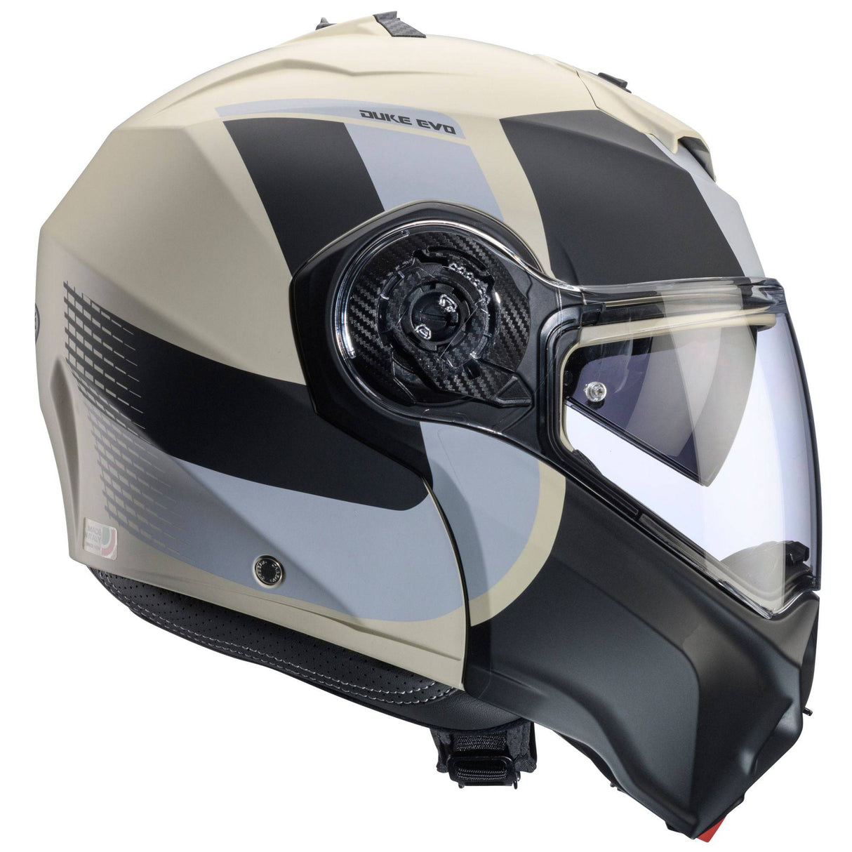 Matt-sand und schwarz-grauer Klapphelm von Caberg Duke Evo Indy, sichtbare Helmschale mit Belüftungsöffnungen.