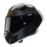 Schwarzer Caberg Helm GP01 Carbon als Integralhelm, mit klarer Visier und aerodynamischem Design.