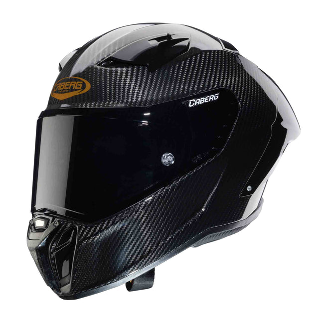 Schwarzer Caberg Helm GP01 Carbon als Integralhelm, mit klarer Visier und aerodynamischem Design.