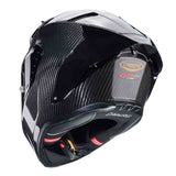 Schwarzer Caberg GP01 Carbon Integralhelm mit schlichter Optik und belüfteten Lüftungsöffnungen, Blick auf Visier und aerodynamisches Design