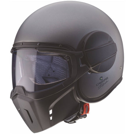 Matt-graue Caberg Ghost X Jethelm mit metallic-grauen Akzenten, leichtes Design, komfortabler Sitz und moderne Optik.