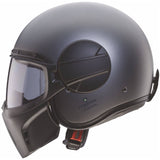 Matt-gun metallic Jethelm von Caberg Ghost X mit aerodynamischem Design und klarem Visier, ideal für stilvolle Sicherheit.