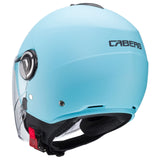 Leichte Caberg Riviera V4 X Jethelm in matt hellblau mit Visier und Belüftung, für sicheren Fahrkomfort.