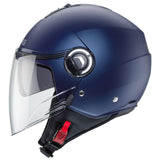 Matt-blauer Jethelm von Caberg Riviera V4 X mit Yama-Design, sichtbare Helmform und Belüftung an der Oberseite.